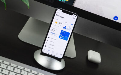 Phone in Docking Station with Keyboard and Monitor